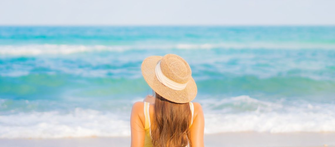 Portrait beautiful young asian woman relax smile leisure around beach sea ocean on travel vacation trip